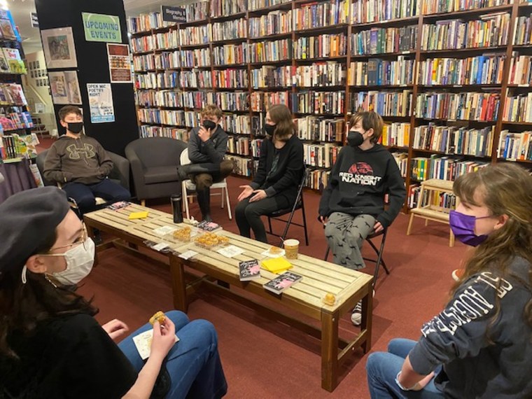 A recent meeting of the Kutztown banned book club. The students are discussing their latest read, "The Hate U Give."