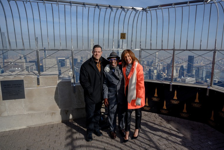 Carson Daly, Al Roker and Hoda Kotb on top of the Empire State Building.