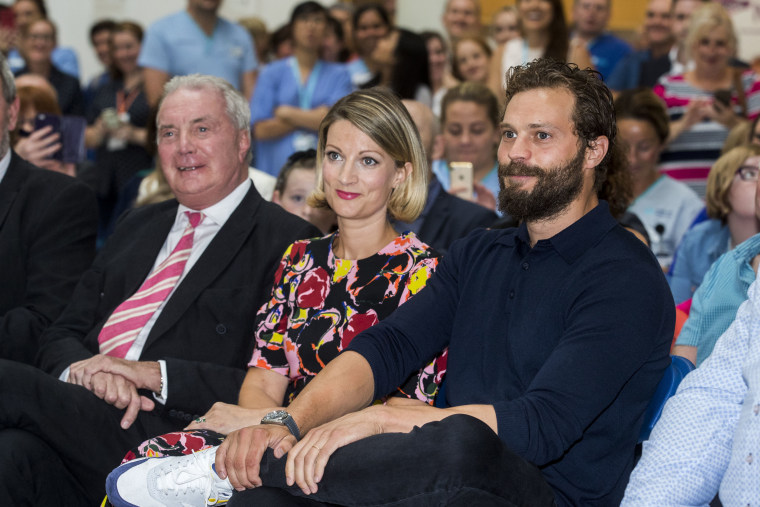 Northern Irish actor Jamie Dornan with his sister Jessica Dornan Lynas and father Dr Jim Dornan, during the Pancreatic Cancer charity NIPanC launch at the Mater Hospital in Belfast.
