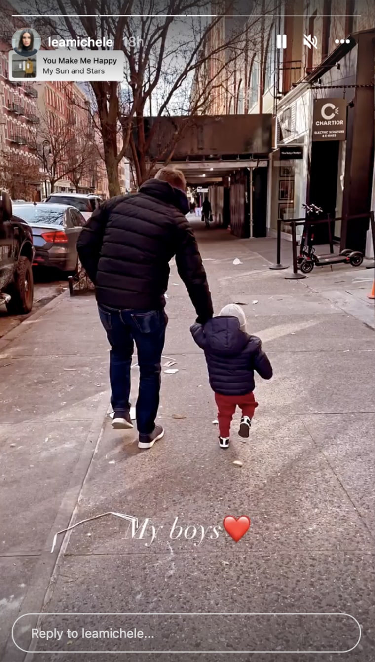 Michele captured a sweet moment with husband Zandy Reich walking with their son, Ever.