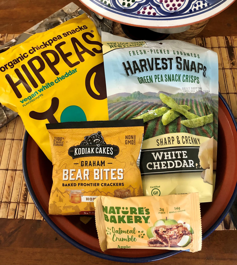 Hippeas, Harvest Snaps, Nature’s Bakery, and Kodiak Cakes make grab-and-go snacks with a little fiber and protein.
