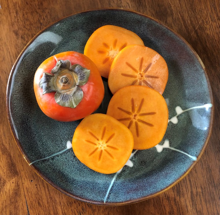 Persimmons are delicious in salads, or sliced in a grilled cheese sandwich. And the color is insane.