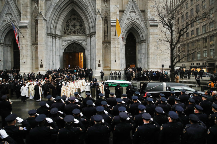 The casket of fallen NYPD Officer Jason Rivera is brought out of St. Patrick's Cathedral during his funeral on January 28, 2022 in New York City. The 22-year-old NYPD officer was shot and killed on January 21 in Harlem while responding to a domestic distu