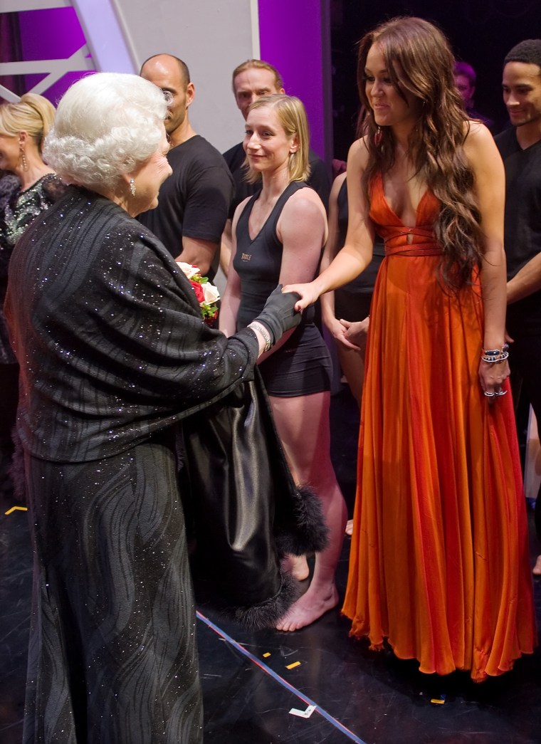 Queen Elizabeth II meets Miley Cyrus in 2009