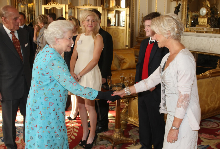 Queen Elizabeth II greets Helen Mirren