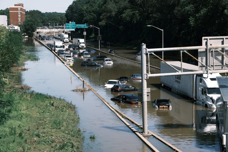 Image: Cars sit abandoned on the flooded Major Deegan Expressway in the Bronx following a night of heavy wind and rain from the remnants of Hurricane Ida on Sept. 2, 2021 in New York City.
