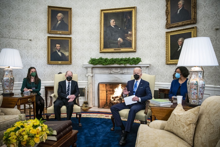 Image: German Chancellor Olaf Scholz and President Joe Biden speak to reporters before the start of a bilateral meeting in the Oval Office at the White House on Feb. 7, 2022.