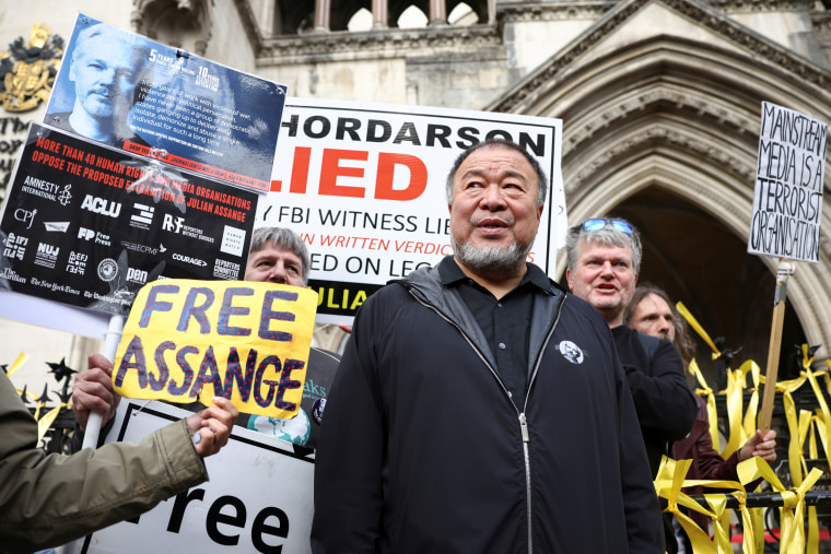 Supporters of Wikileaks founder Julian Assange protest in London