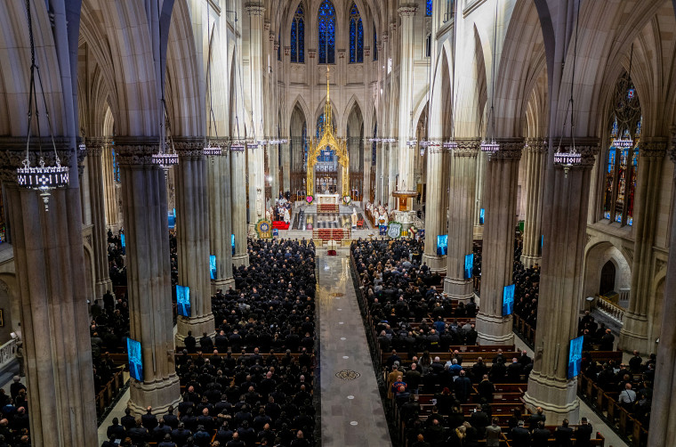 Image: Slain NYPD officer Wilbert Mora is memorialized during a funeral service at St. Patrick's Cathedral in New York on Feb. 2, 2022.