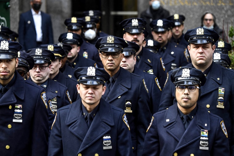 Image: New York police officers gather for the funeral of officer Wilbert Mora on Feb. 2, 2022, in New York.