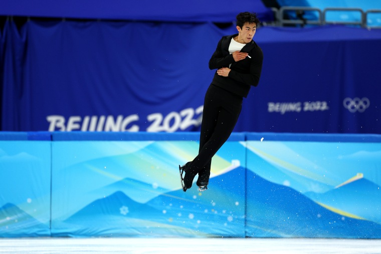 Nathan Chen skates in the Men's single skating short program team event during the 2022 Beijing Olympics on Feb. 4, 2022.