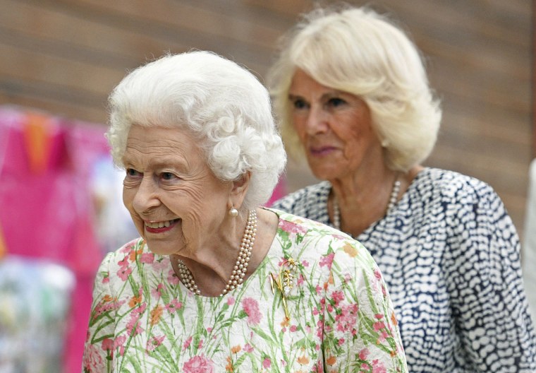 Queen Elizabeth and Camilla, the Duchess of Cornwall, attend an event in 2021. 
