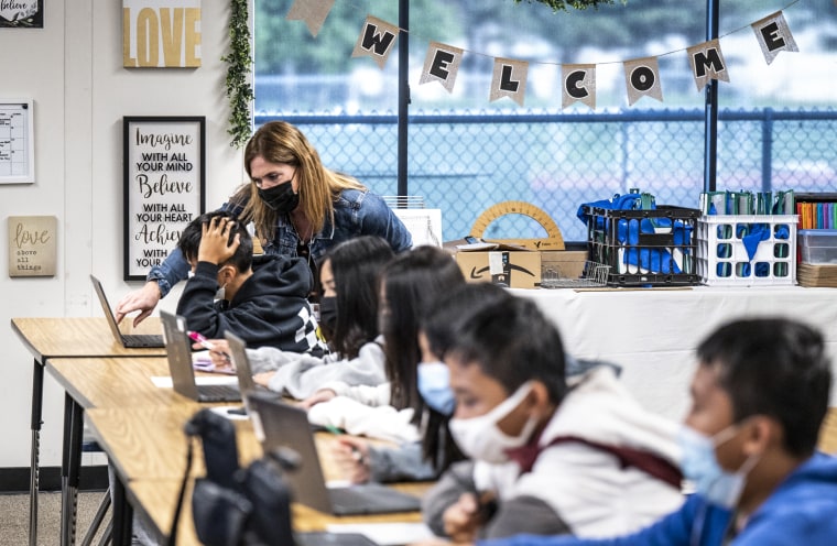 A substitute teacher in a 7th grade math class at Vista View Middle School in Huntington Beach, Calif., on Jan. 20, 2022.