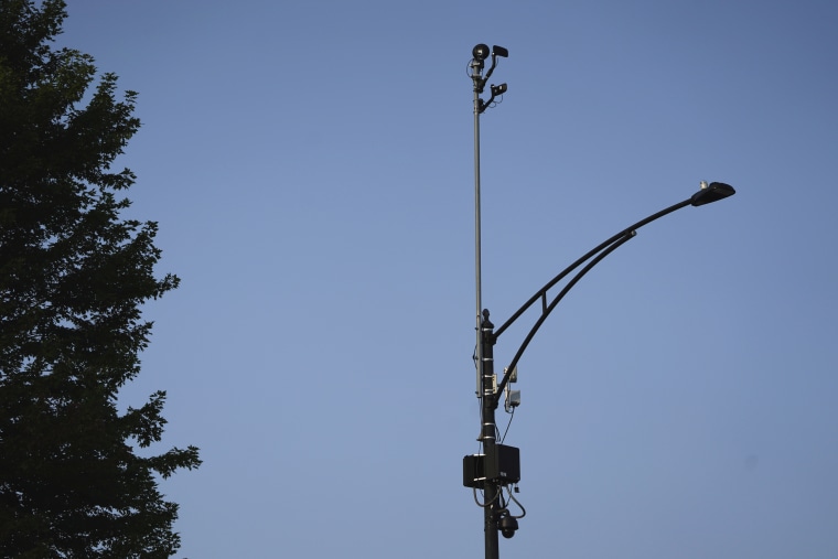 IMage: ShotSpotter equipment overlooks a street in Chicago on Aug. 10, 2021.