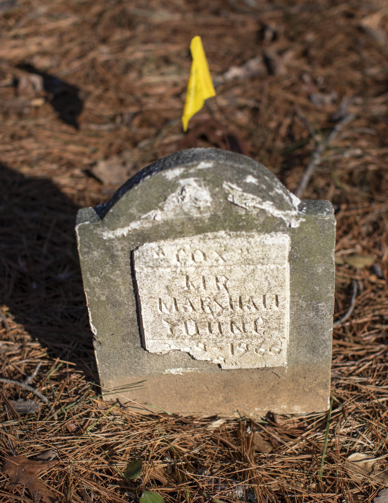 A worn-down headstone at the Macedonia African Methodist Church Cemetery in Johns Creek, Ga.