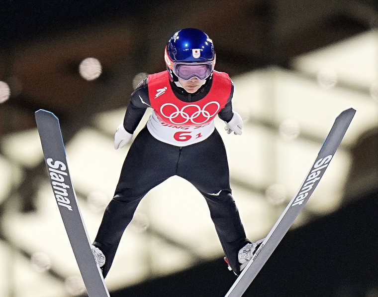 Sara Takanashi of Japan competes in the first final round of the ski jumping mixed team event at the Beijing Winter Olympics on Feb. 7, 2022, at the National Ski Jumping Centre in Zhangjiakou, China.