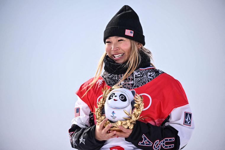 Image: Gold medalist Chloe Kim of Team USA poses on the podium during the venue ceremony