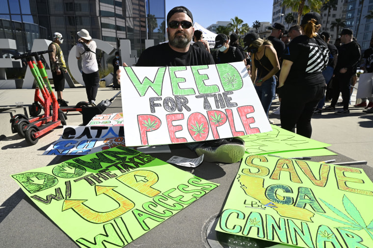 Long Beach, CA - February 09: Elliott Lewis, chief executive of Catalyst Cannabis Co., attends a rally against taxes on businesses like his in Long Beach, Calif., on Feb. 9, 2022.