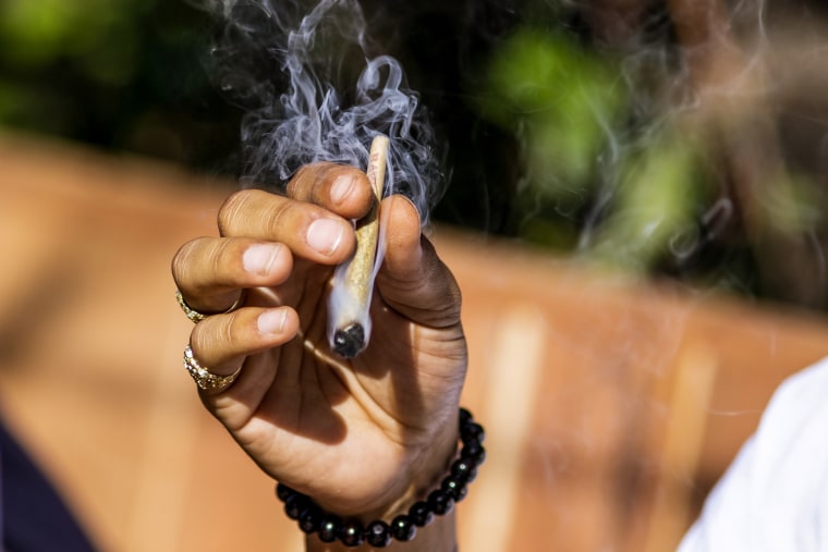 A customer smokes marijuana at the Lowell Cafe, a new cannabis lounge in West Hollywood, Calif., U.S., on Oct. 1, 2019.