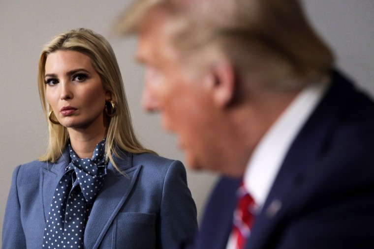President Donald Trump speaks as his daughter and senior adviser Ivanka Trump looks on during a news briefing at the White House March 20, 2020.