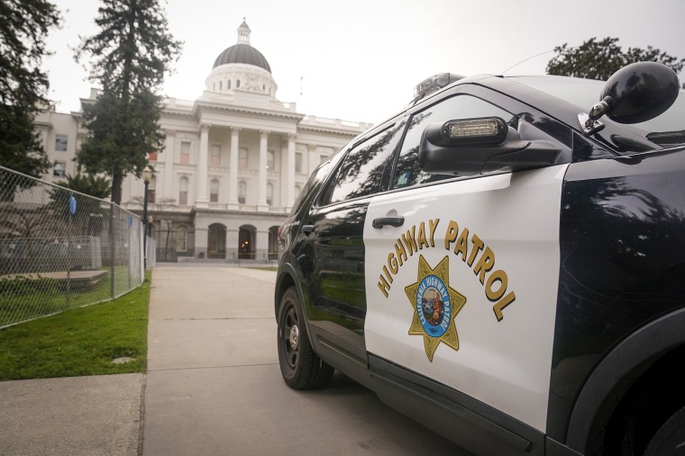 Image: A California Highway Patrol vehicle is parked outside the state Capitol in Sacramento, Calif, on Feb. 14, 2022.