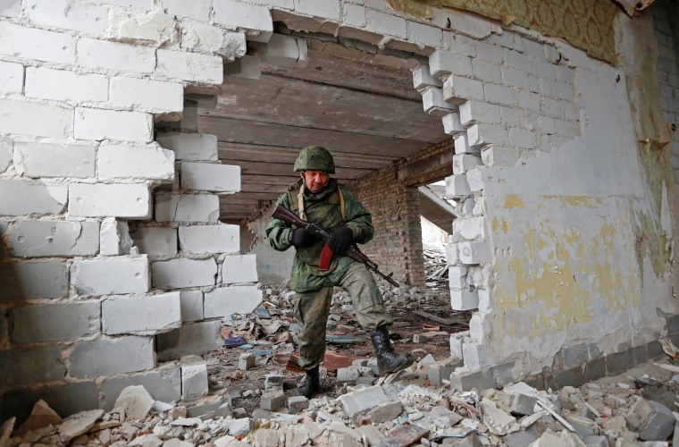 Image: Pro-Russian rebels patrol area near separation line in Luhansk region