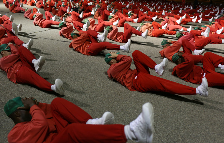 Image: Inmates at the Lakeview Shock Correctional Facility exercising.