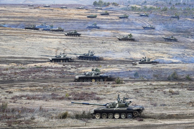 Tanks move during the Union Courage-2022 Russia-Belarus military drills at the Obuz-Lesnovsky training ground in Belarus on Feb. 19, 2022.
