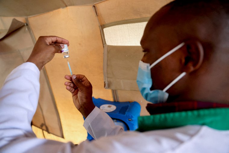 FILE PHOTO: FILE PHOTO: Healthcare professional prepares a dose of AstraZeneca (COVID-19) vaccine, in Narok