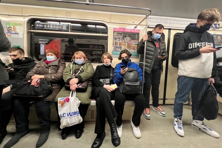 Kyiv residents ride the subway in Ukraine's capital this morning.