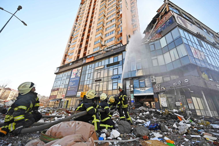 Firefighters extinguish fire in a high-rise apartment