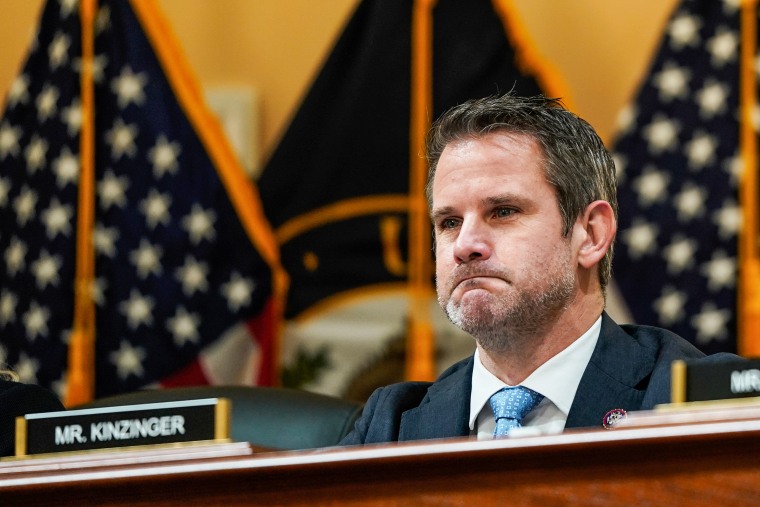 Rep. Adam Kinzinger, R-Ill., listens to a colleague speak during a meeting on Capitol Hill on Dec. 1, 2021.