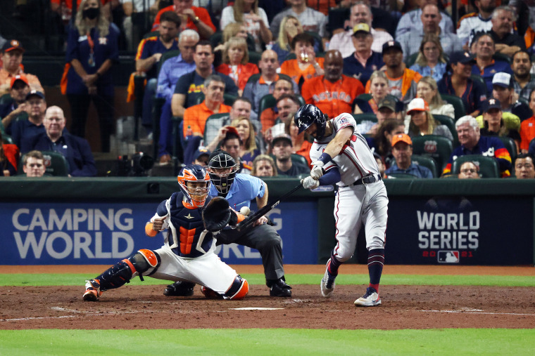 Dansby Swanson #7 of the Atlanta Braves hits a two-run home run against the Houston Astros during the fifth inning in Game Six of the World Series on Nov. 2, 2021, in Houston.