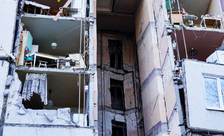 A residential building damaged by recent shelling in Kharkiv, Ukraine, on Feb. 27, 2022.