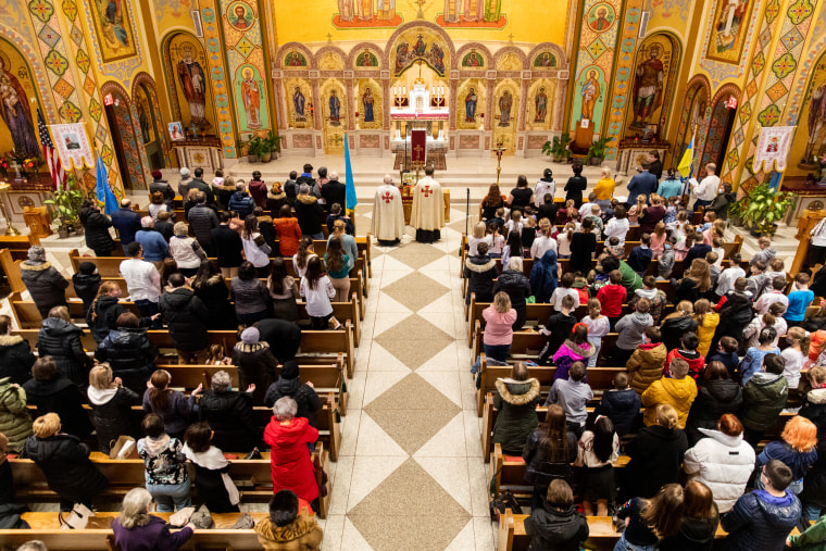 People attend a prayer service for Ukraine at St. George Ukrainian Catholic Church on Feb. 26, 2022, in New York.