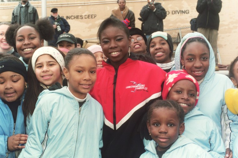Bonaly continues to promote ice skating, particularly in communities of color, like her meeting with students from the group Figure Skating in Harlem.