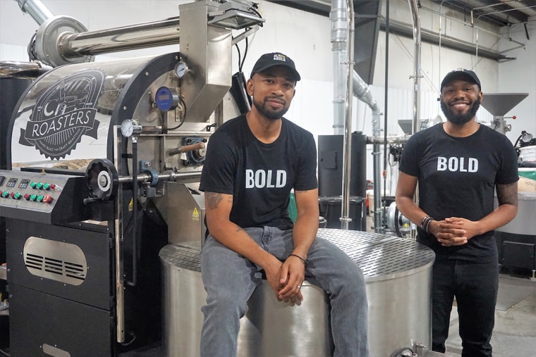 Cezar and Johnson in their roasting facility in Des Moines, Iowa.