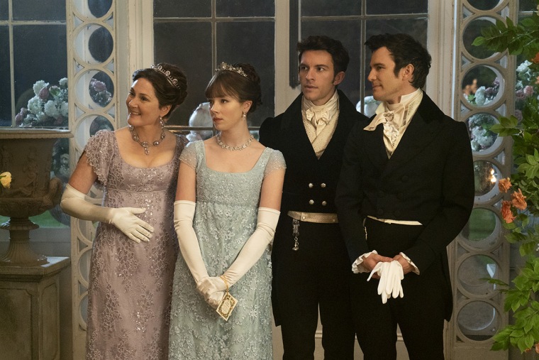 Ruth Gemmell as Lady Violet Bridgerton, Claudia Jessie as Eloise Bridgerton, Jonathan Bailey as Anthony Bridgerton, and Luke Thomspon as Benedict Bridgerton in "Bridgerton."