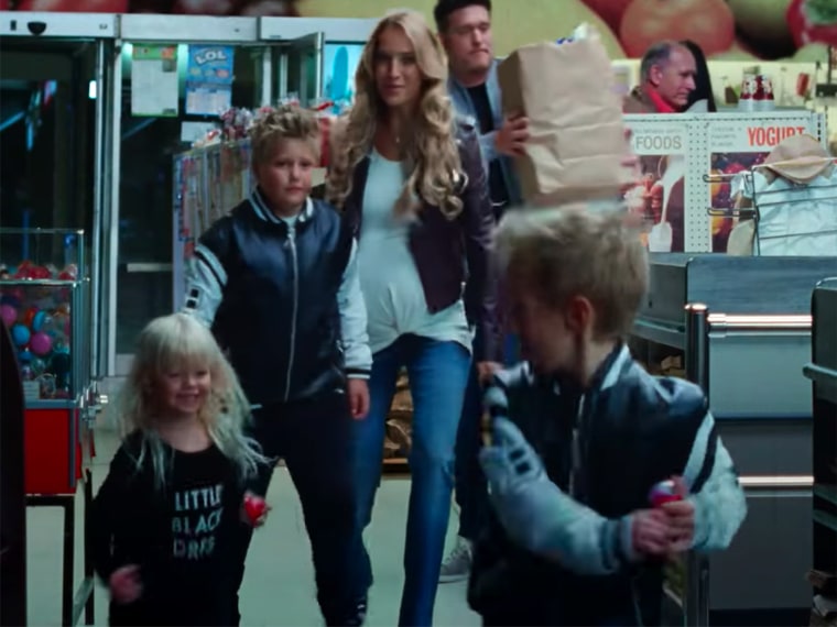 Lopilato's growing baby bump can be seen in the last 20 seconds of Bublé's new music video. 