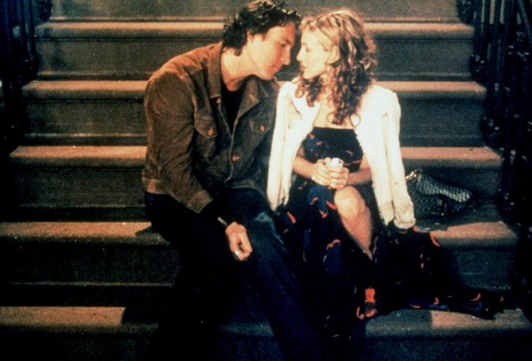 Actors Sarah Jessica Parker and John Corbett act in a scene from the HBO television series "Sex and the City" third season, episode "No Ifs Ands Or Butts."