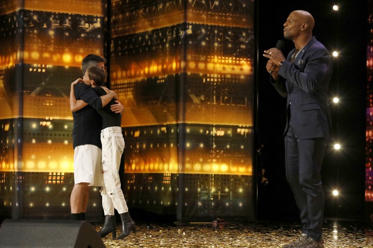 Simon Cowell hugs Jane "Nightbirde" Marczewski on "America's Got Talent"