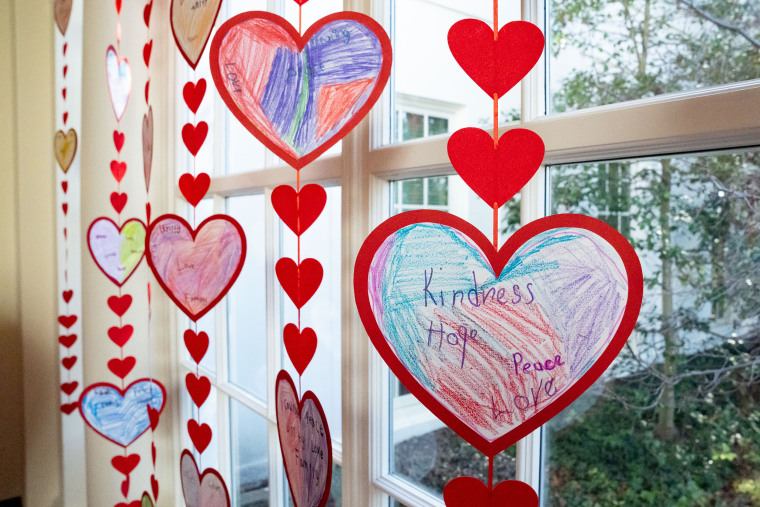 Each student was asked to use a set of words, reflecting the First Lady’s values, to guide their Valentine’s Day heart designs.