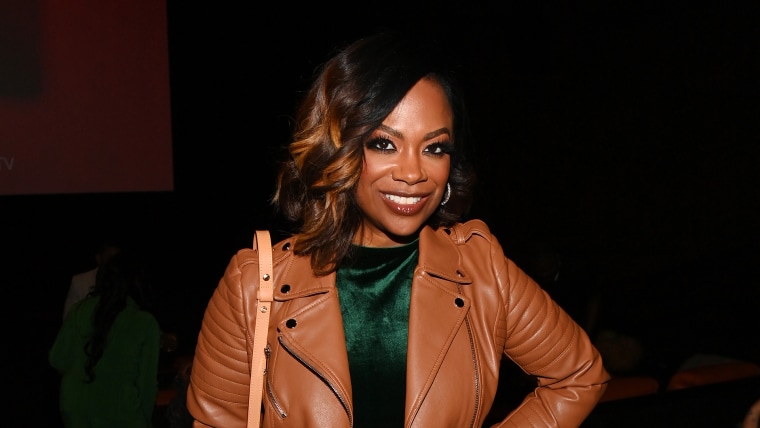 Kandi Burruss attends the Atlanta screening of Lifetime's "Line Sisters" at IPIC Theaters at Colony Square on February 10, 2022 in Atlanta, Georgia.