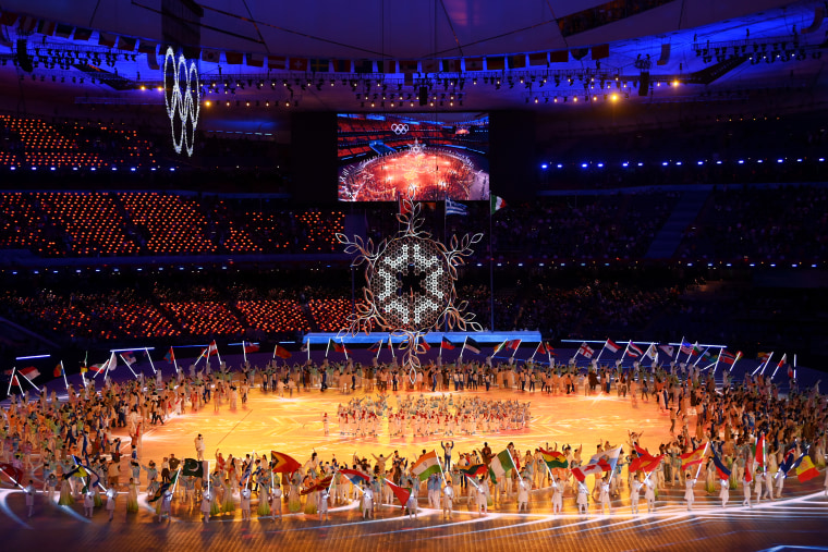 The Olympic cauldron and rings are seen as the flags of the competing countries are waved during the Beijing 2022 Winter Olympics Closing Ceremony on Day 16 of the Beijing 2022 Winter Olympics at Beijing National Stadium on February 20, 2022 in Beijing, C