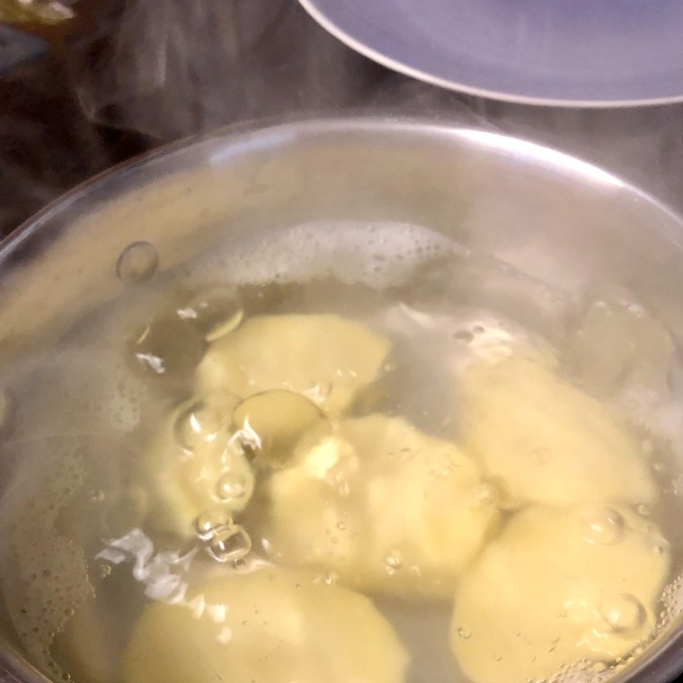Bubble, bubble, toil and trouble: boiling potatoes to make potato milk.