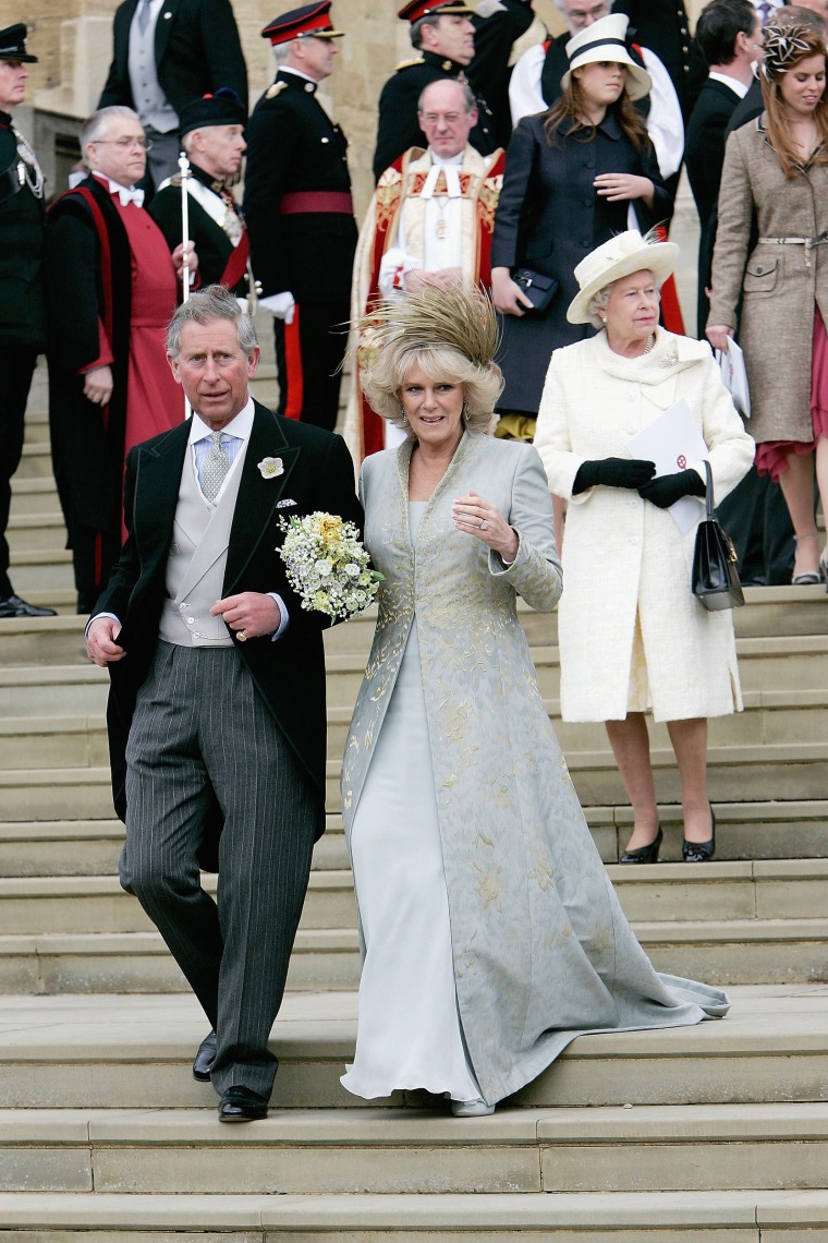 The Prince of Wales, Prince Charles, and The Duchess Of Cornwall, Camilla Parker Bowles in silk dress by Robinson Valentine and head-dress by Philip Treacy walk ahead of Queen Elizabeth II, at the Service of Prayer and Dedication blessing their marriage a