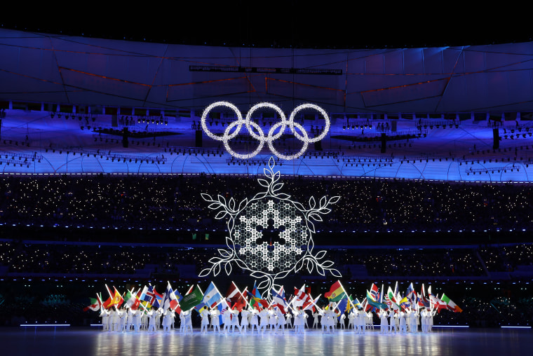 The Olympic rings and cauldron are seen alongside the flags of the competing countries during the Beijing 2022 Winter Olympics Closing Ceremony on Day 16 of the Beijing 2022 Winter Olympics at Beijing National Stadium on February 20, 2022 in Beijing, Chin