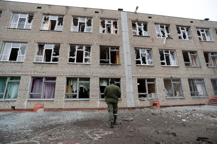 Image: A view shows a damaged school building in the Donetsk region