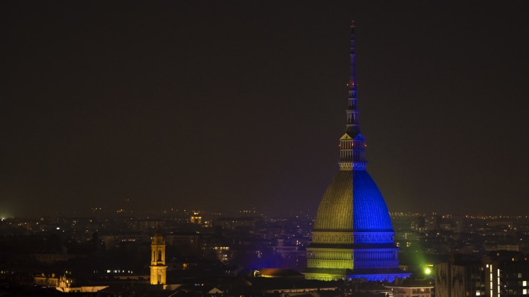 The Mole Antonelliana, major landmark in Turin, is lit up in