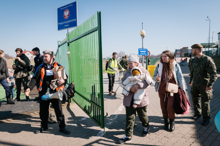 At the Medyka border crossing in southeastern Poland, Alexander Federov greets Ukrainians fleeing the war with a smile and some hearty Ukrainian warmth: “Vse bude dobre,” or “Everything will be fine.”